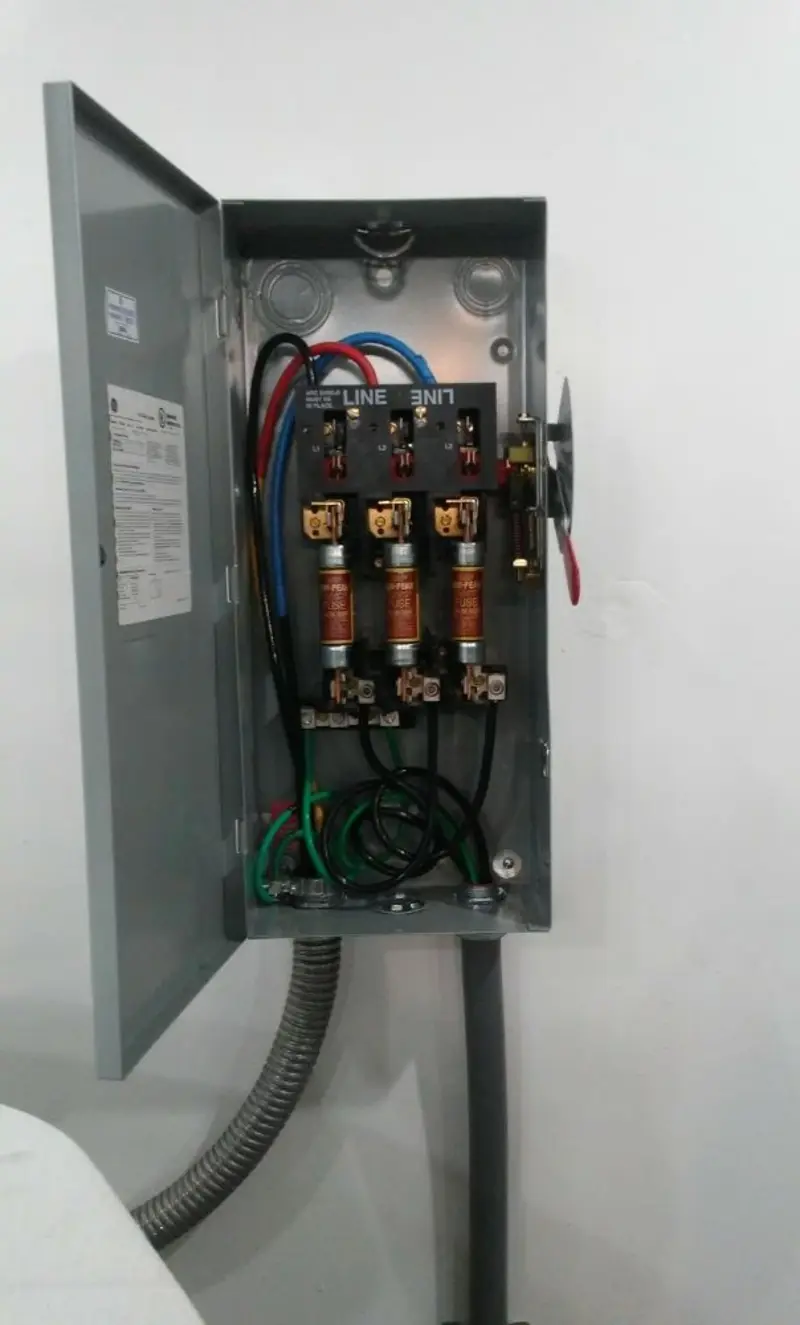 Three-phase disconnect switch installed for Smoke Detector Installation in Seacliff
